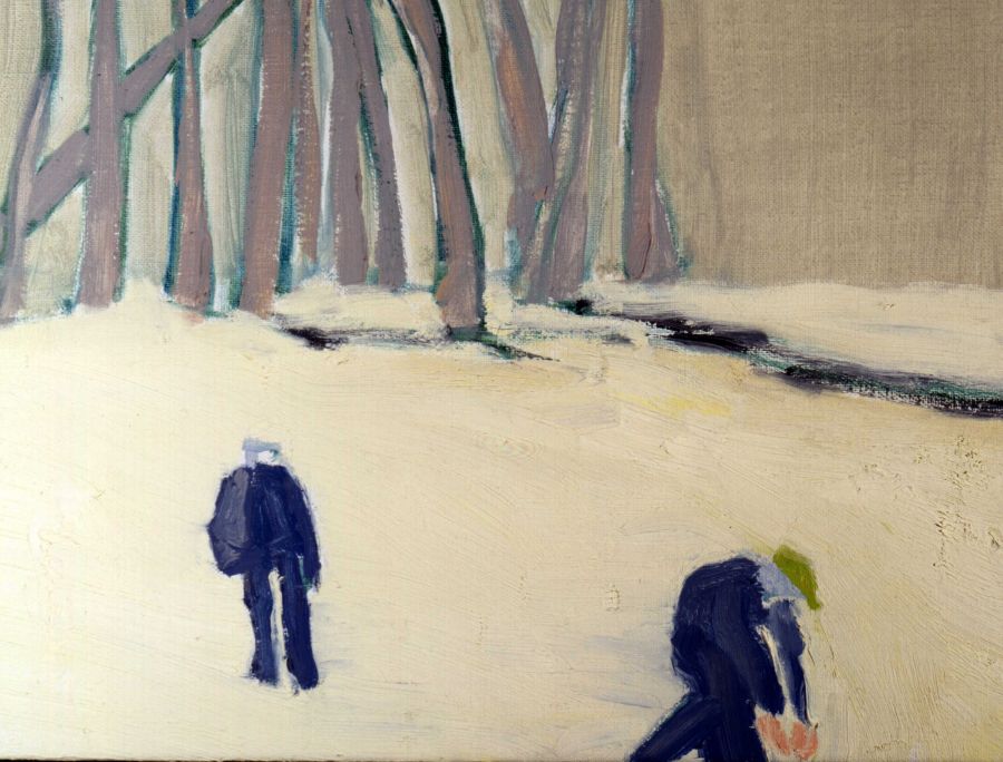 Two figures in a snowy woodland.