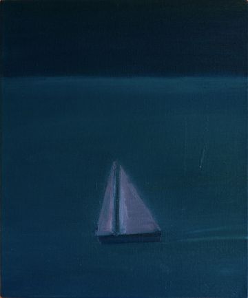 A boat sailing at night.