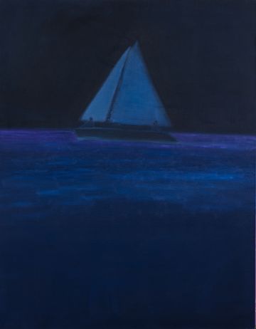 A sailing boat at night.