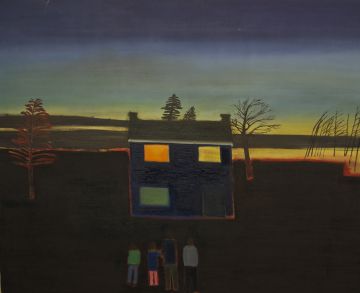 A family of four standing in front of their house by the seashore at night.