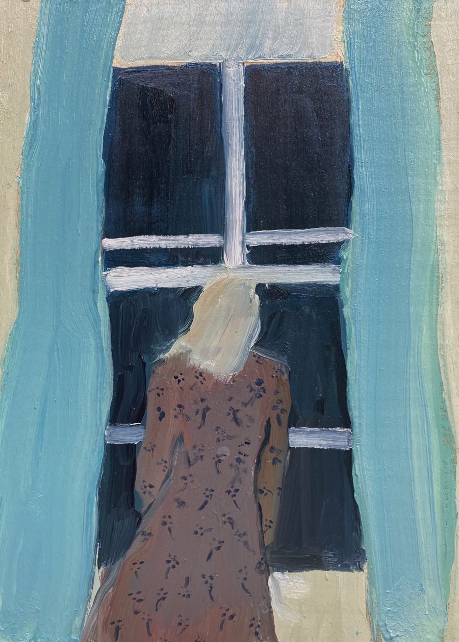A blonde woman staring out a window at the night sky.