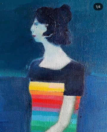 Portrait of a woman wearing a multicoloured dress.